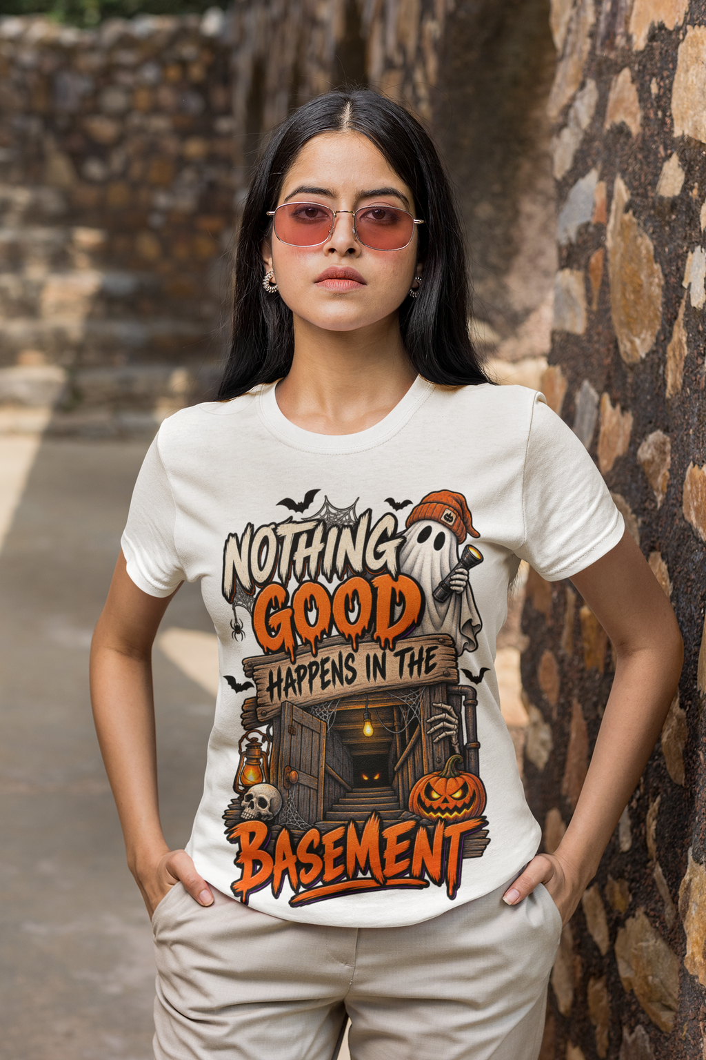 HALLOWEEN GRAPHIC T-SHIRT FEATURING THE PHRASE NOTHING GOOD HAPPENS IN THE BASEMENT