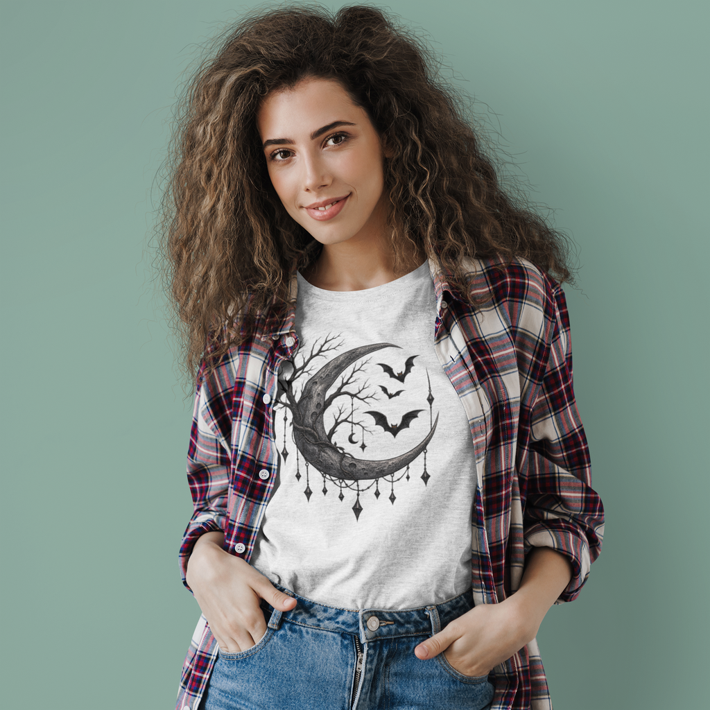 Halloween T-shirt featuring a mystical moon, dangling, charms, bats, and a tree