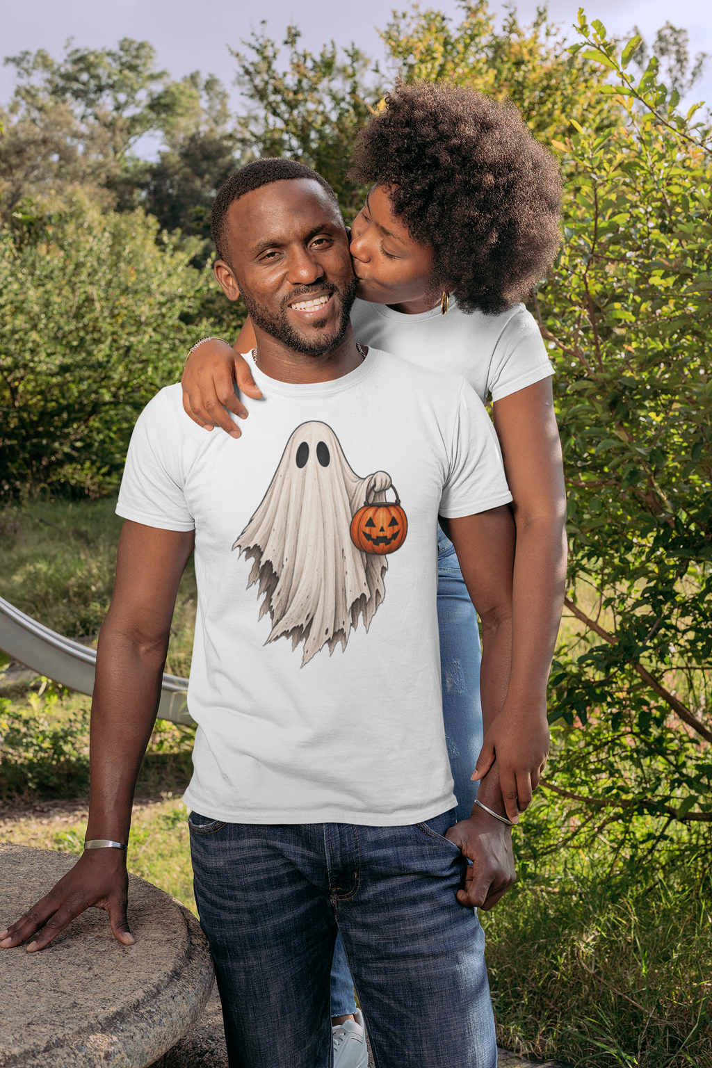 Halloween T-shirt, featuring a tattered ghost carrying a candy bucket